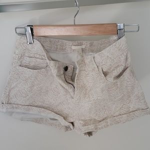Tan and white shorts